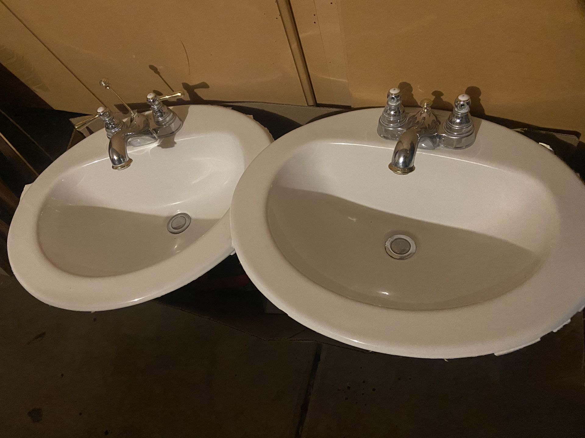 2 sink and faucet sets.