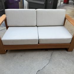 Shay 68" Outdoor Sofa In Oiled Eucalyptus they are on sale at wayfair they are $1269 with tax  