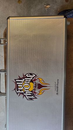 2 cases of poker chips, dice and cards.