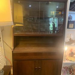 38x16x67 vintage wood and glass doors hutch, buffet, China cabinet, shelving, glass doors, storage or bar. 325.00.  Johanna at Antiques and More. Loca