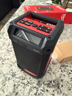 Milwaukee  M12  Bluetooth radio with charger