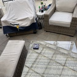 2 padded chairs , 0ne coffee table includes two ottoman