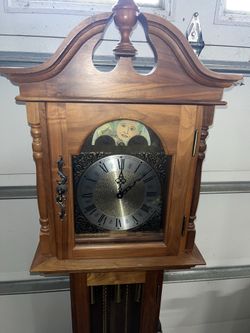 Emperor grandfather clock with a nautical moon face dial. 77”Hx 16”L x10” D