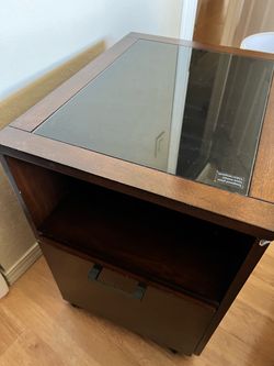 Dark Wood Rolling Cabinet with Tempered Glass Top