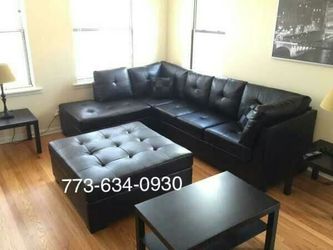 Brand new black leather sectional sofa