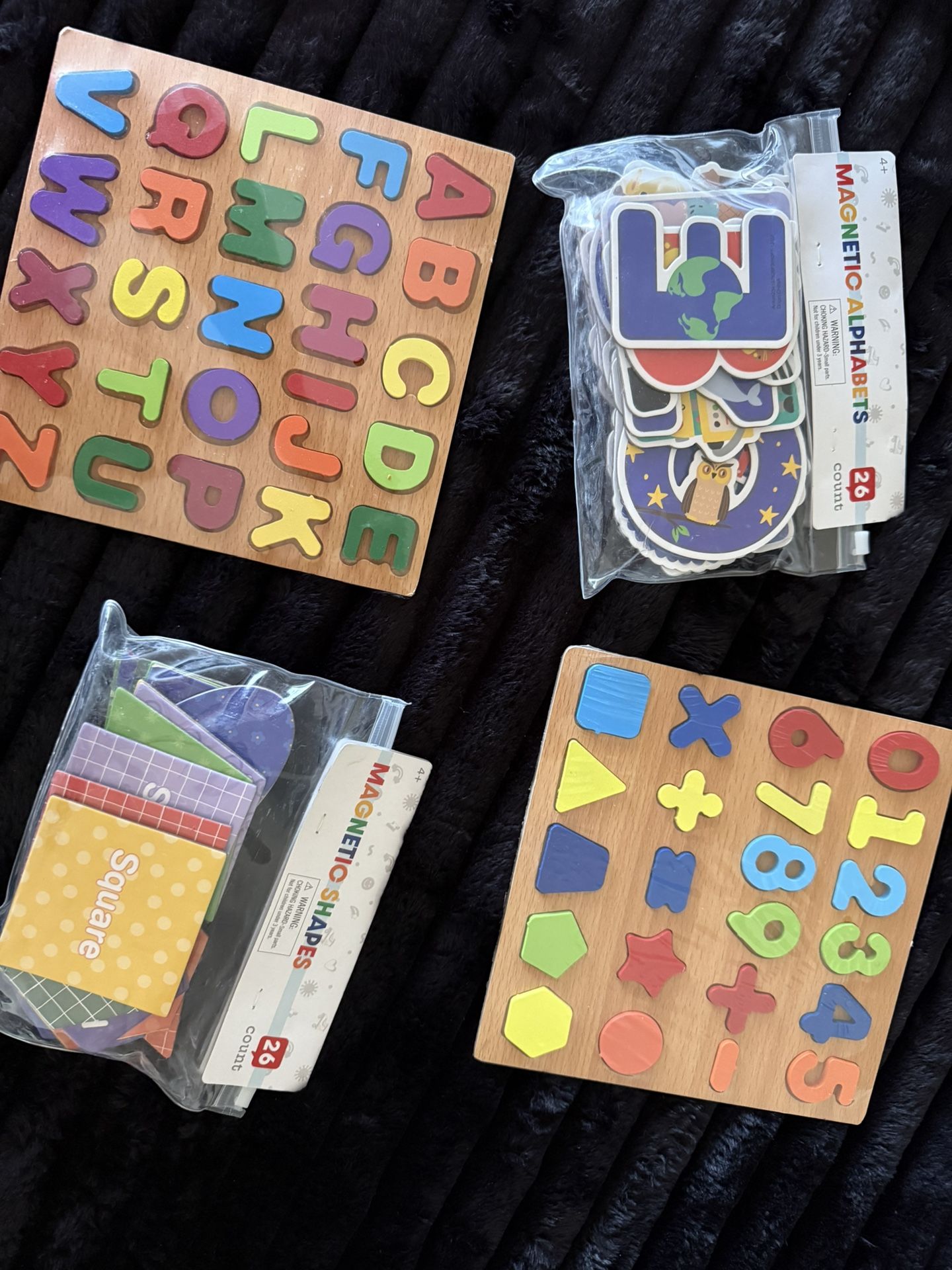 4 Pcs children's educational toys, including wooden puzzles and magnetic shapes/alphabets.