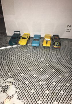Too hot wheels and three random cars