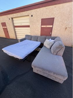 WITH DELIVERY sectional couch  pull out bed