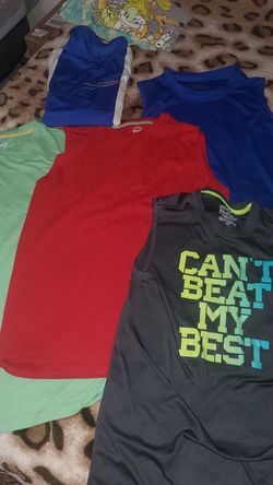 Boys tanktops 6 pieces all together and a pair of swim shorts take all for $7.00