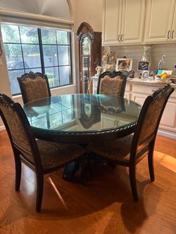 DINING TABLE AND 6 CHAIRS