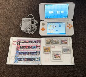 New Nintendo 2DS XL Bundle (6 Games + Charger)