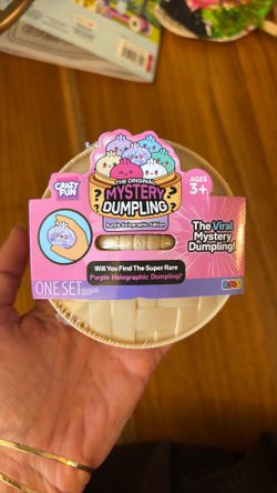 Mystery squishy, dumpling, purple holographic