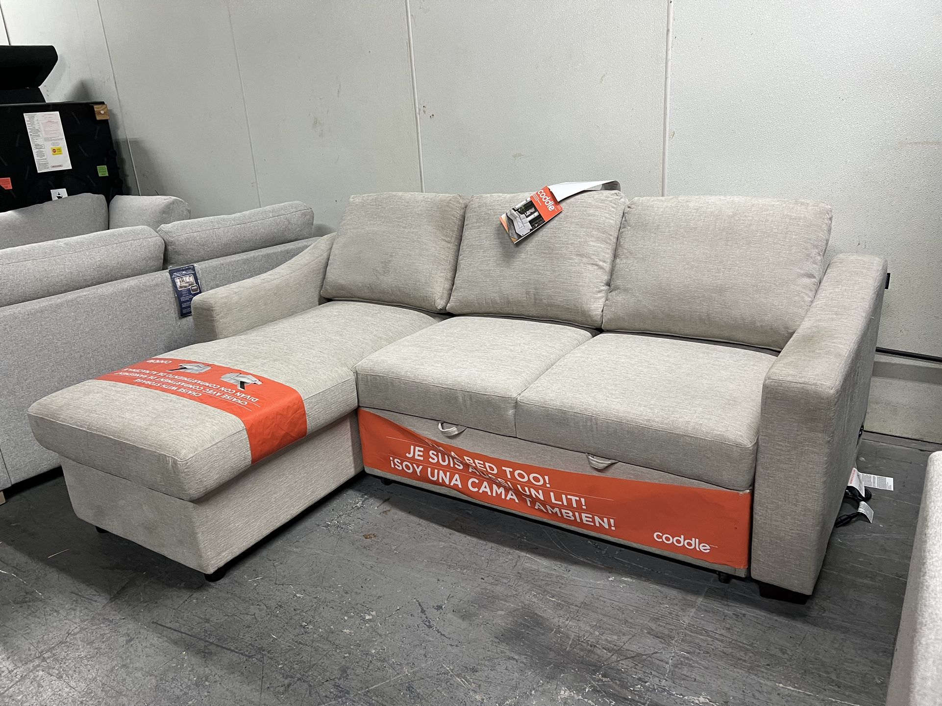 Coddle Aria sleeper sofa with reversible chaise and storage  