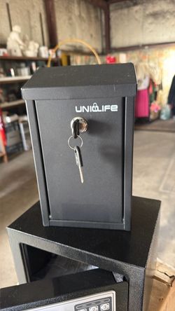 Lockable wall drop box