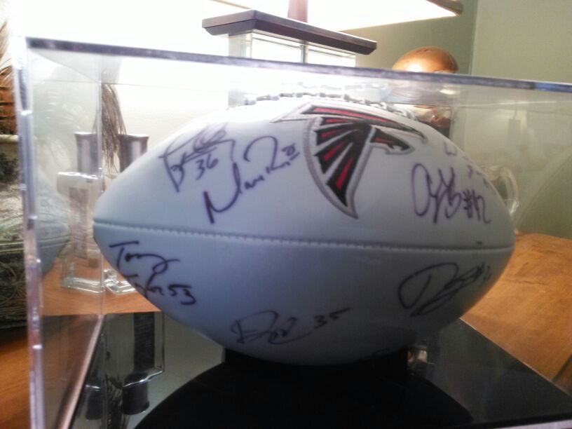 Authentic Matt Ryan and seven others signed football with case
