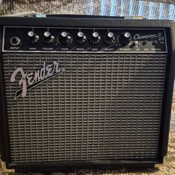 Two Amps 1 Orange 20rt And a Fender Champion 11 25w