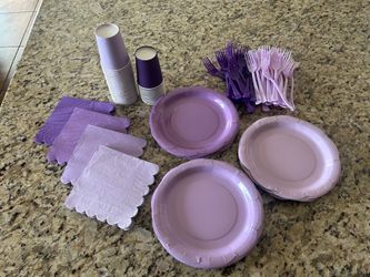 Purple and blue paper plates, napkins, cups