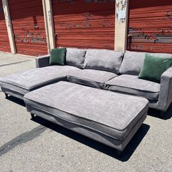 Living Spaces Gray Sectional Sofa Chaise With Ottoman