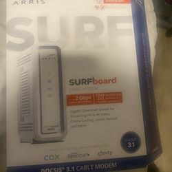 Arris Surfboard -Free Must Pick Up Before 2 PM TODAY in North Scottsdale