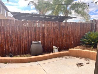1 in. D x 6 ft. H x 8 ft. W Natural Bamboo Fence Decorative Rolled Fencing Panel