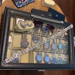 Glasses Chain Rings Watches And A Braclet