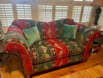 Two Southwest loveseats