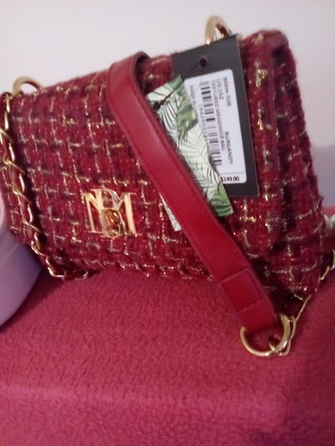 New Purse $149.00. New Shoes $16.99