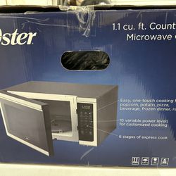Oster 1.1 Cu Ft Microwave