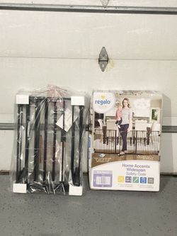 56-74” Regalo gate (new )- 28” height 