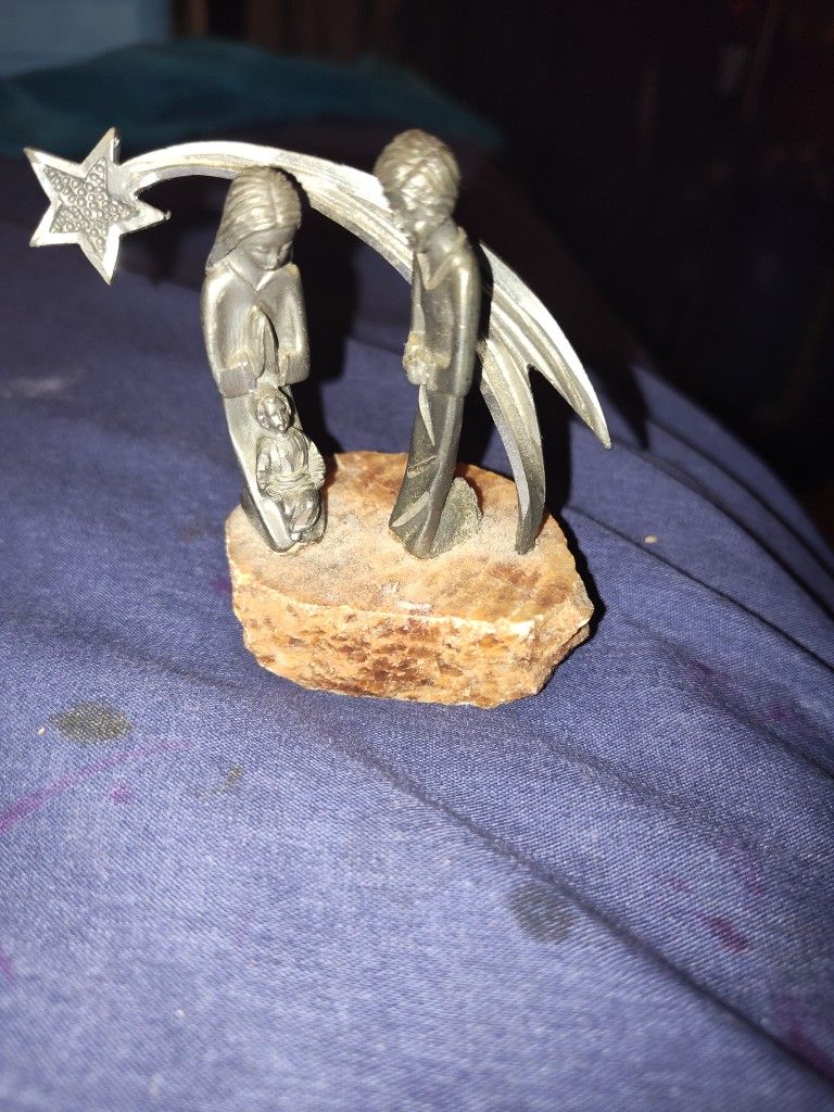 This is a vintage pewter statue figure made in Italy, crafted from pewter. It is a handmade collectible home decor item that showcases fine craftsman