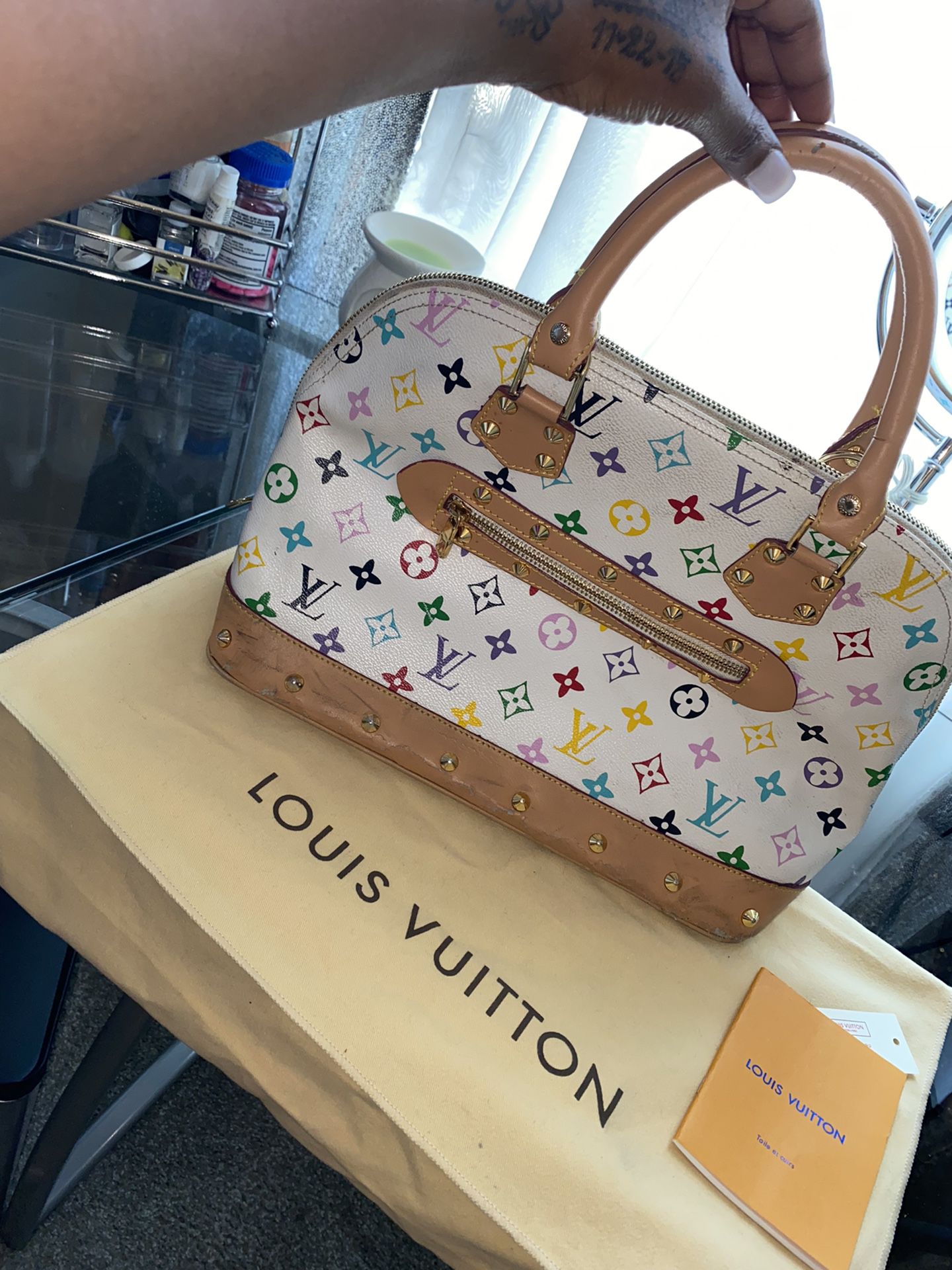 Louis Vuitton Multicolor Pochette for Sale in Clermont, FL - OfferUp