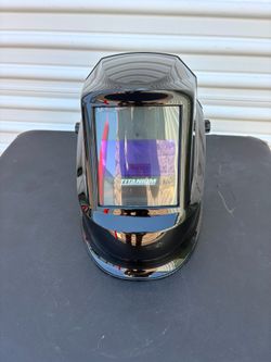 TITANIUM 7 sq. in. Auto-Darkening Welding Helmet This TITANIUM™️ Auto-Darkening Welding Helmet