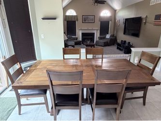 Dark sold wood kitchen table
