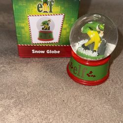 Elf snow globe