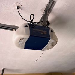 Garage Door Opener Broken Spring Off Track Replace Adjustment And Parts 