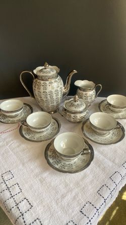 Vintage tea set. Silver and white