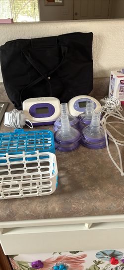 2 Lansinoh Breast Pumps With Extra Pieces