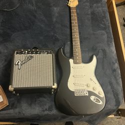 Austin Electric guitar with amp and stand
