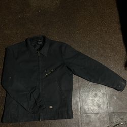 Black Dickies jacket with paint stains