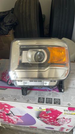 GMC driver headlight