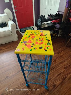 Rolling wire rack with table top