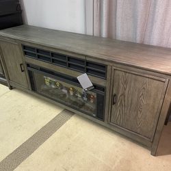Montillan Grayish Brown 84" TV Stand w/ Electric Fireplace Insert