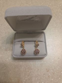 14 k gold earrings.  Weight is 2.9 grams