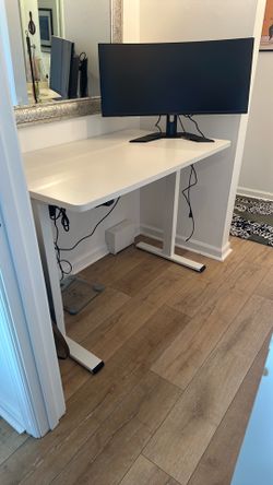 Electric hight adjustable desk
