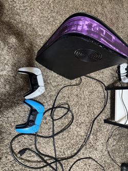 Black PlayStation 5 with atomic purple dark plates