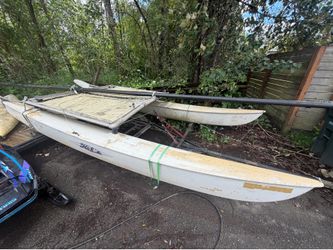 Hobie catamaran sailboat 16’ with trailer and nice sails