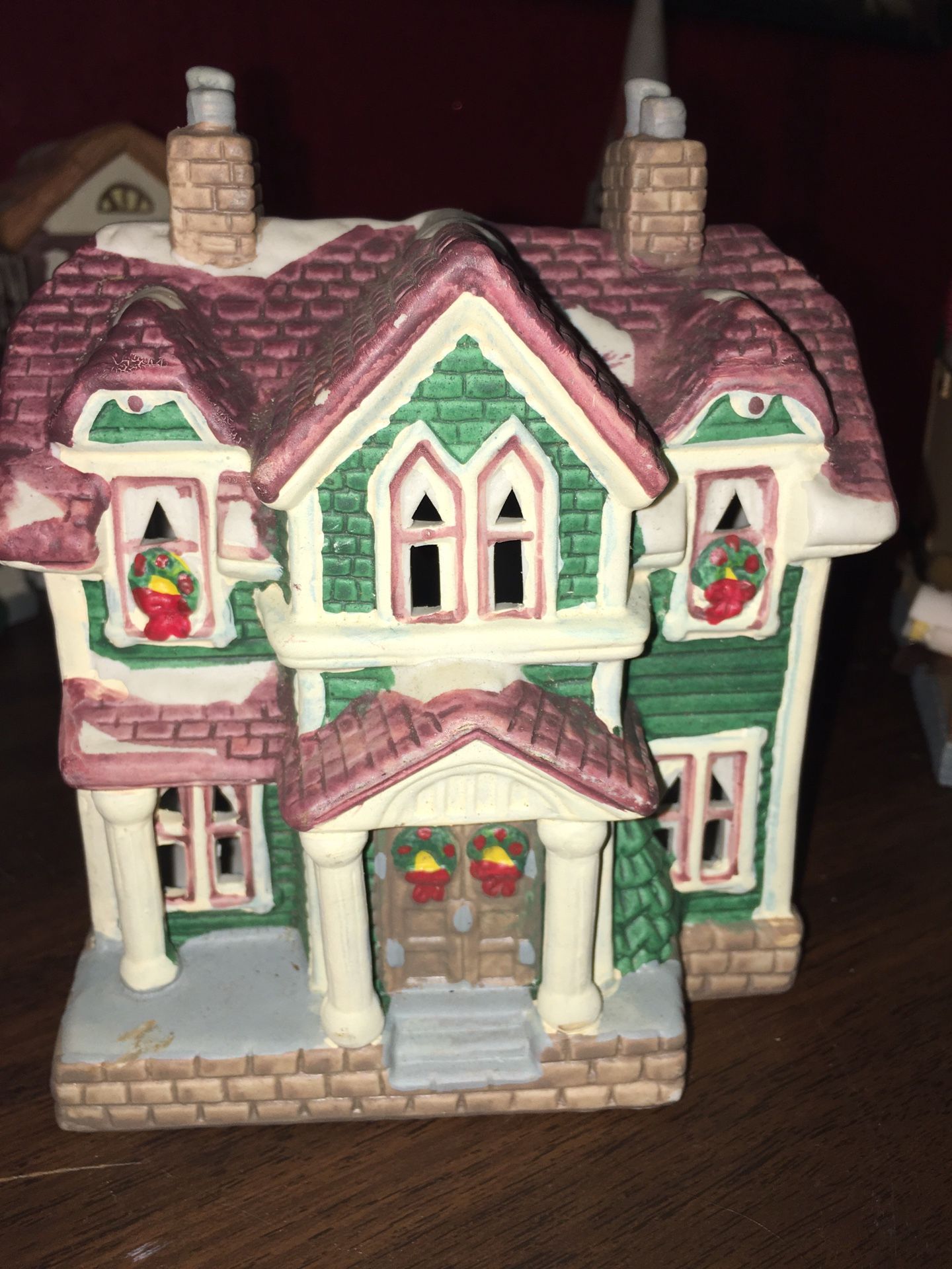 Hand painted porcelain house decorated in Christmas