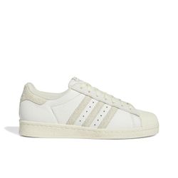 Adidas x Undefeated Superstar 80v sneakers featuring white snakeskin-textured stripes