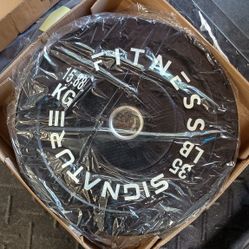 Pair Of 35lb Olympic Bumper Plates (Brand new in box)