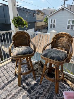 Two Vintage Ratana Tiki Barstools